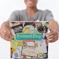 Child holding Pretend Play Veterinarian set for imaginative learning and fun.
