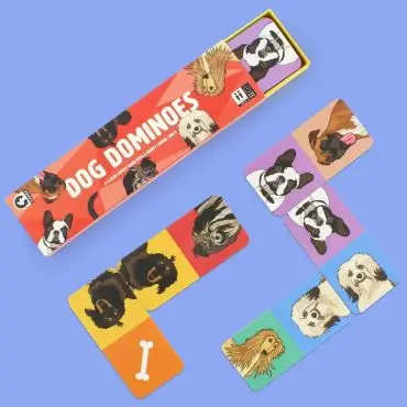 Dog-themed dominoes set with colorful tiles and playful illustrations on a blue background.