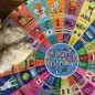 Colorful dog-themed puzzle with fluffy paws, showcasing dog breeds and woof in various languages.