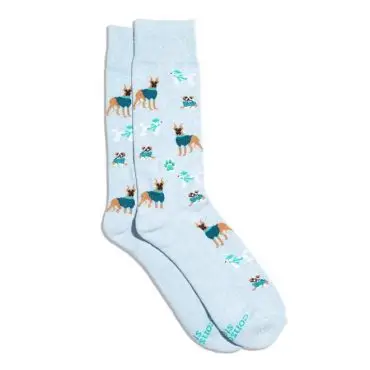 Light blue socks with dog patterns and paw prints for a playful style.