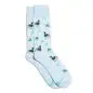 Light blue socks with dog patterns and paw prints for a playful style.