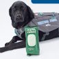 Black Labrador wearing a vest with dog wipes in the foreground, featuring logo earth rated and KOKO.
