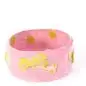 Pink ceramic pet bowl with yellow polka-dotted bone design, ideal for stylish pet feeding.