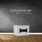 Gray dog toy storage box with bone design, 12x10.5x9 inches, against a blackboard wall with wooden floor.