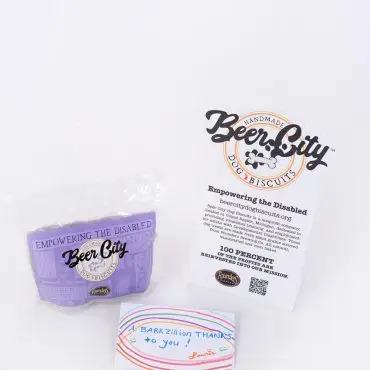 Beer City Dog Biscuits packaging with a thank you note and informational card on white background.