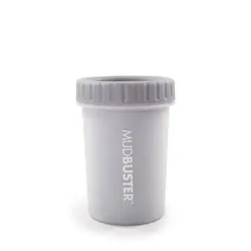 Gray MudBuster pet paw cleaner cup with ridged lid, designed for easy cleaning of muddy paws.