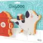 Dog and fire hydrant-shaped kitchen sponges on package background. Fun cleaning supplies.
