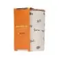 Pet treat jar with bone designs and wooden lid in orange packaging. Perfect for storing dog snacks.