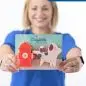 Smiling woman holding Dirty Dog kitchen sponges shaped like a dog and fire hydrant, labeled Kelly Jo Staff.