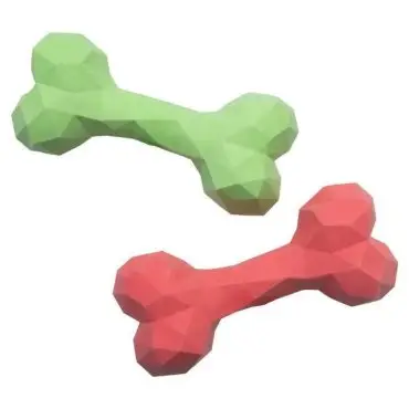 Green and red geometric dog chew toys shaped like bones on a white background.