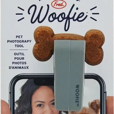 Woofie pet photography tool packaging with a clip and treat for capturing perfect dog photos.