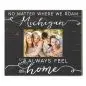 Decorative frame with family photo, text: Michigan will always feel like home. Black background, white script.