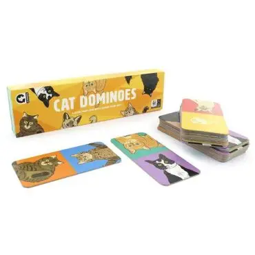 Cat-themed domino set featuring colorful cat illustrations on tiles and box packaging. Fun family game for all ages.