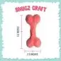 Geometric red dog bone toy, 5.5 inches tall and 2.5 inches wide, from Snugz Craft.