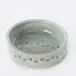 Ceramic pet bowl with paw print design on the rim, speckled glaze finish. Perfect for small dogs or cats.