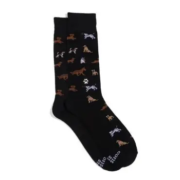 Black socks with colorful dog patterns and paw prints, perfect for pet lovers.