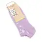 Purple socks with paw prints from Conscious Step, labeled socks that save dogs. Fair trade product.