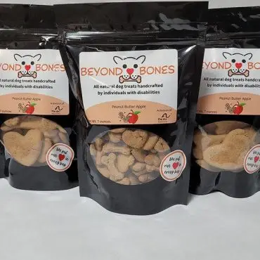 All-natural dog treats, handcrafted peanut butter apple flavor from Beyond Bones, 7-ounce bags.