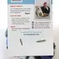 Back of product packaging with brand details, usage instructions, and photo of creator with a dog.
