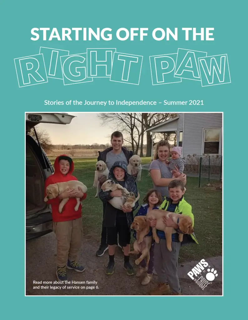 Family with puppies celebrating Starting Off on the Right Paw for Paws and Claws magazine, Summer 2021 edition.