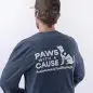 Man wearing Paws With a Cause charity shirt, promoting assistance and facility dogs.