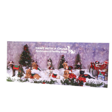 Assistance dogs in festive outfits surrounded by snow and holiday decor, promoting Paws With a Cause.
