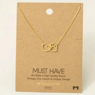 18K gold necklace featuring a heart and paw print pendant, displayed on a Must Have card.
