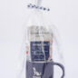 Gift set with Grounds & Hounds Foster Fuel coffee and a Paws with a Cause mug, wrapped in a clear bag with paw ribbon.