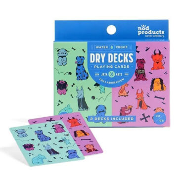 Colorful waterproof playing cards with dog illustrations by NOD Products, includes two decks in blue and purple.