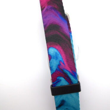 Colorful fabric wristband with blue and pink abstract pattern, featuring a black buckle on a white background.