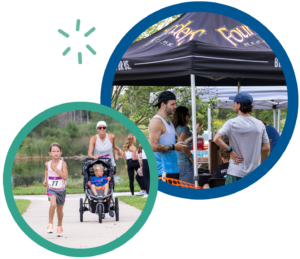 Child runs a race while adults at a tent have a conversation during an outdoor event.